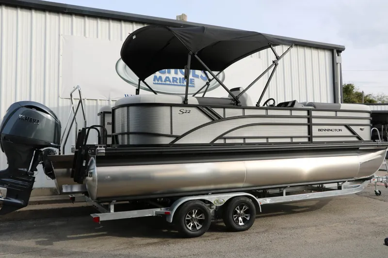 Slide: The Image of Bennington 22 S1SSR Tri Toon 2027 with black sunshade and Yamaha outboard motor. - 13