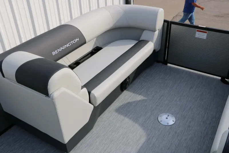Slide: The Image of Bennington 22 S1SSR Tri Toon 2027: Sleek gray and white seating on a boat. - 38