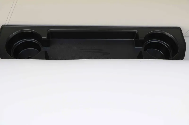 Slide: The Image of Black cup holder on a white background, likely part of a boat. - 32