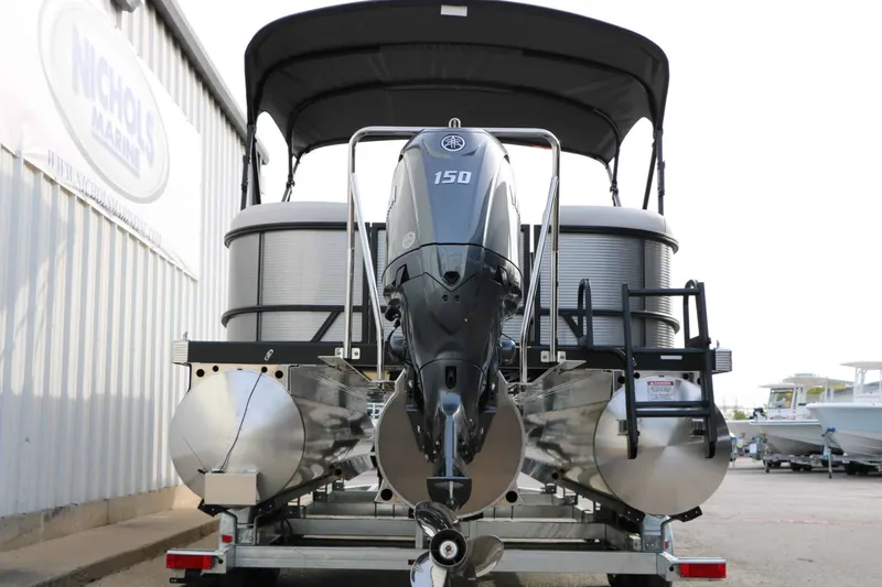 Slide: The Image of Bennington 22 S1SSR Tri Toon 2027 with a 150 HP outboard motor. - 18