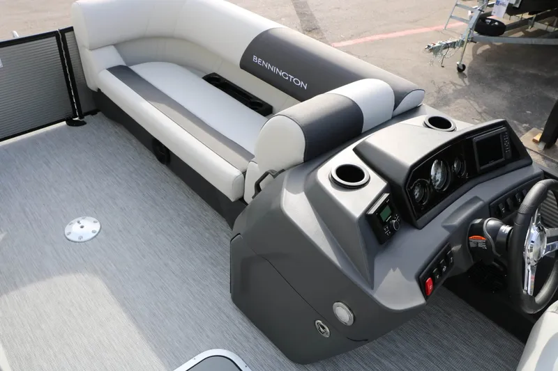 Slide: The Image of Interior of a 2027 Bennington 22 S1SSR Tri Toon with gray and white seating. - 37