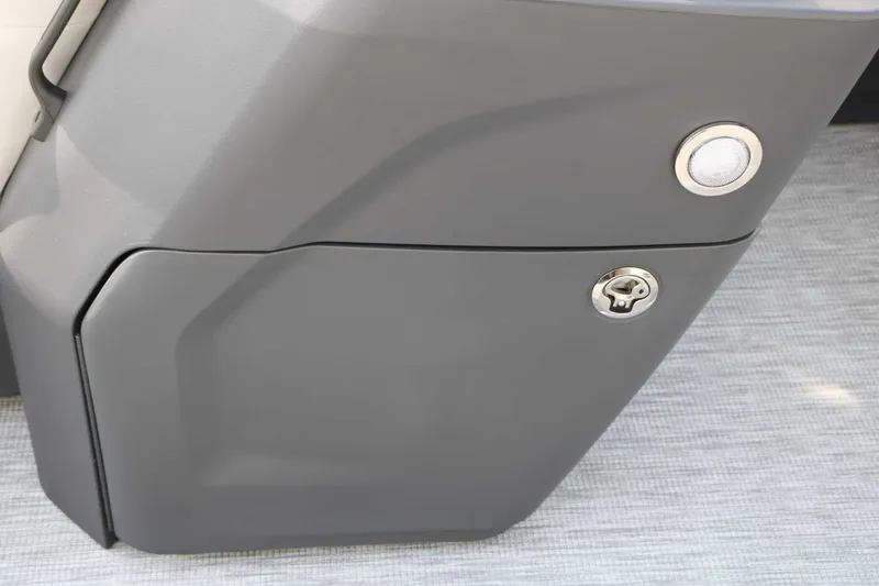 Slide: The Image of Close-up of a gray storage compartment with a lock on a boat. - 42