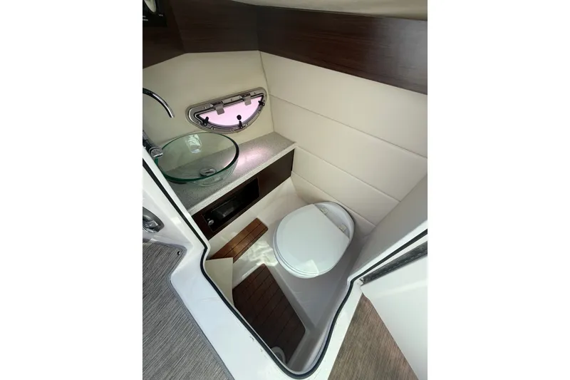 Slide: The Image of Luxurious 2017 Regal 29 OBX boat bathroom with modern fixtures and elegant design. - 22