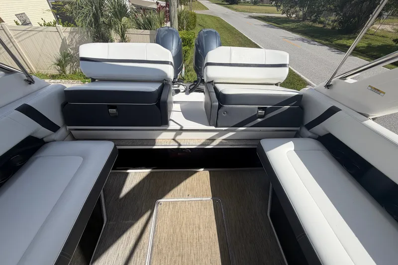 Slide: The Image of Interior of 2017 Regal 29 OBX boat with spacious seating and modern design. - 27
