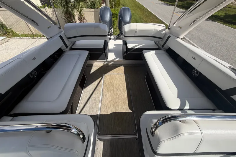 Slide: The Image of Spacious interior of a 2017 Regal 29 OBX boat with comfortable seating. - 23