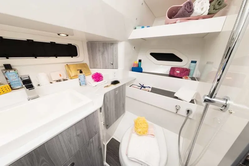 Slide: The Image of Luxurious bathroom in 2027 Formula 360 Super Sport Crossover yacht, featuring modern amenities. - 47