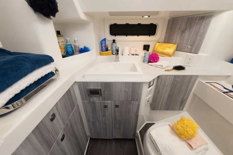 Slide: The Image of 2027 Formula 360 Super Sport Crossover bathroom with modern amenities and sleek design. - 45