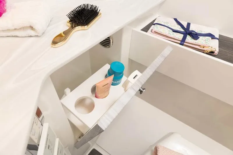 Slide: The Image of Bathroom storage in 2027 Formula 360 Super Sport Crossover with toiletries and accessories. - 51