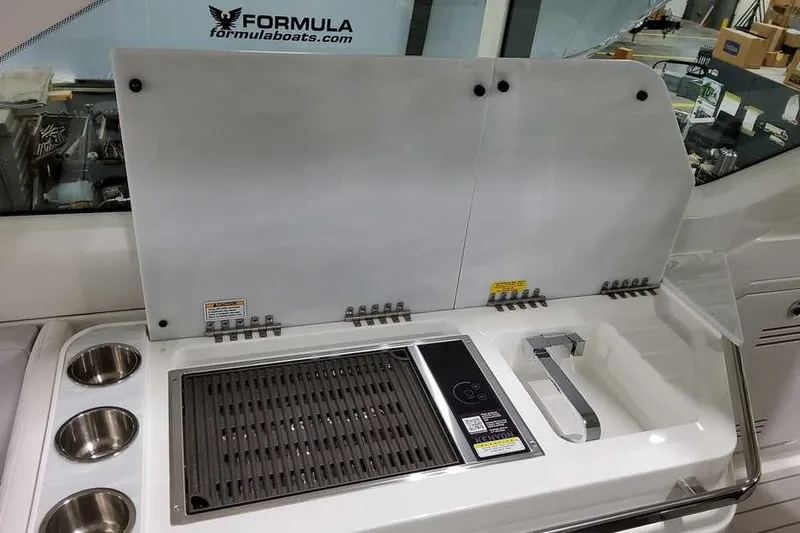 Slide: The Image of Outdoor kitchen setup on 2027 Formula 360 Super Sport Crossover boat. - 21