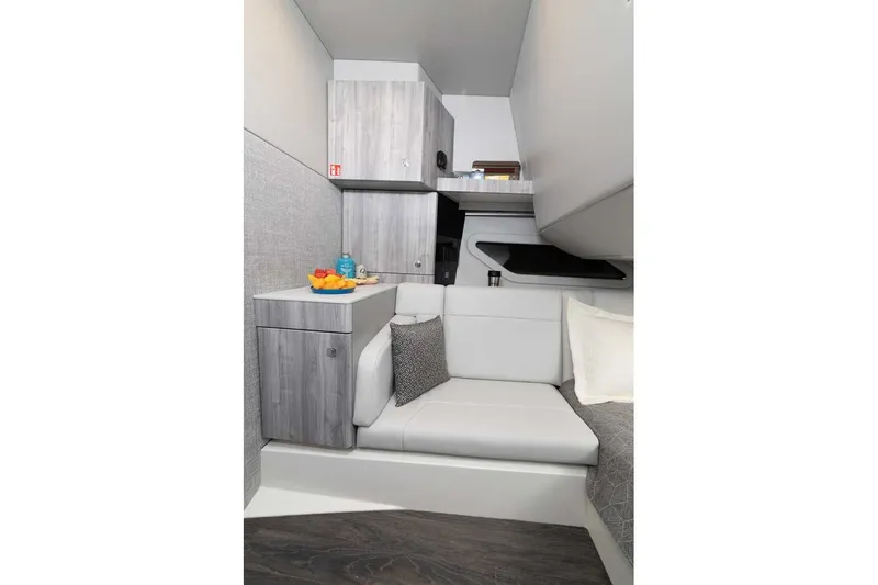 Slide: The Image of Interior of 2027 Formula 360 Super Sport Crossover with modern seating and cabinetry. - 36
