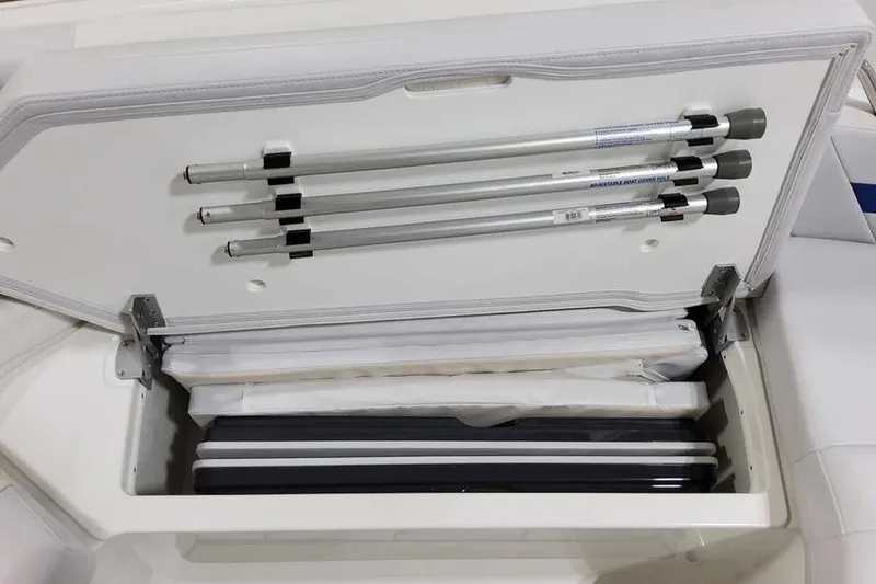 Slide: The Image of Storage compartment in 2027 Formula 360 Super Sport Crossover boat, featuring organized poles. - 31