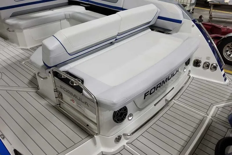 Slide: The Image of 2027 Formula 360 Super Sport Crossover boat with sleek white seating and modern design. - 12