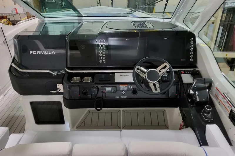 Slide: The Image of Helm of 2027 Formula 360 Super Sport Crossover with modern controls and steering wheel. - 25