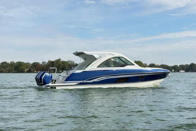 The Image of 2027 Formula 360 Super Sport Crossover boat on a calm lake. - 0