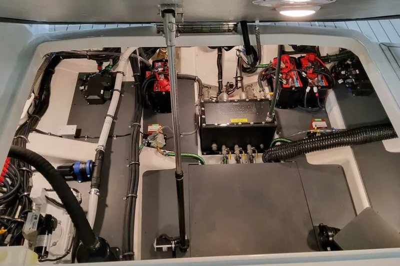 Slide: The Image of Engine compartment of 2027 Formula 360 Super Sport Crossover, showcasing advanced mechanical components. - 15