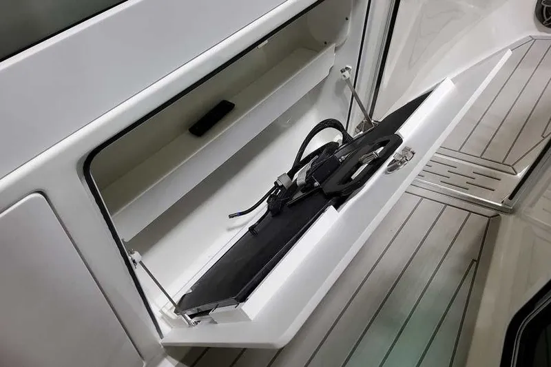 Slide: The Image of Storage compartment in 2027 Formula 360 Super Sport Crossover boat, featuring sleek design. - 27