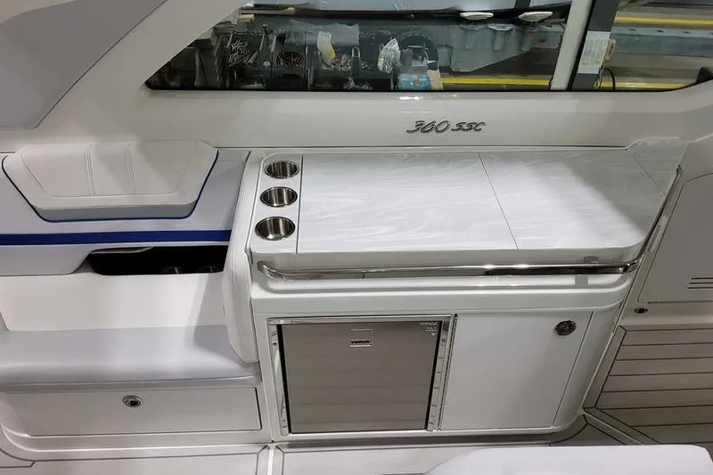Slide: The Image of Interior of 2027 Formula 360 Super Sport Crossover with sleek countertop and built-in storage. - 20