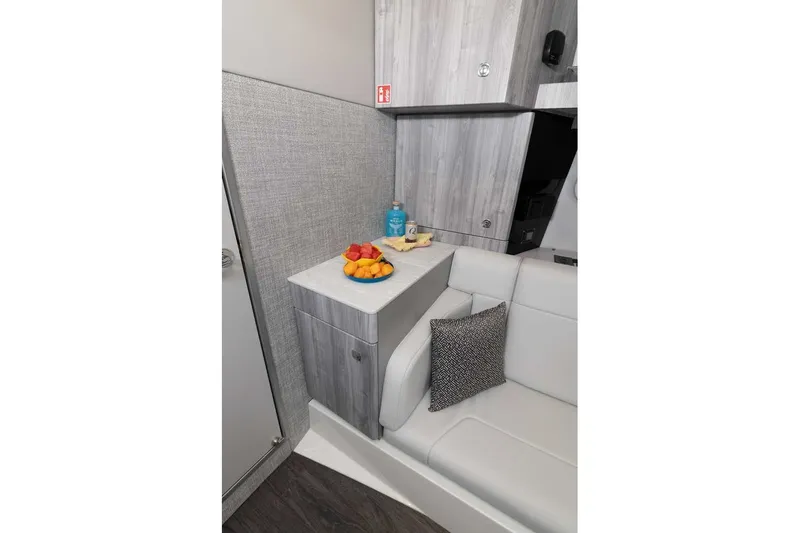 Slide: The Image of Interior of 2027 Formula 360 Super Sport Crossover with modern seating and fruit display. - 38