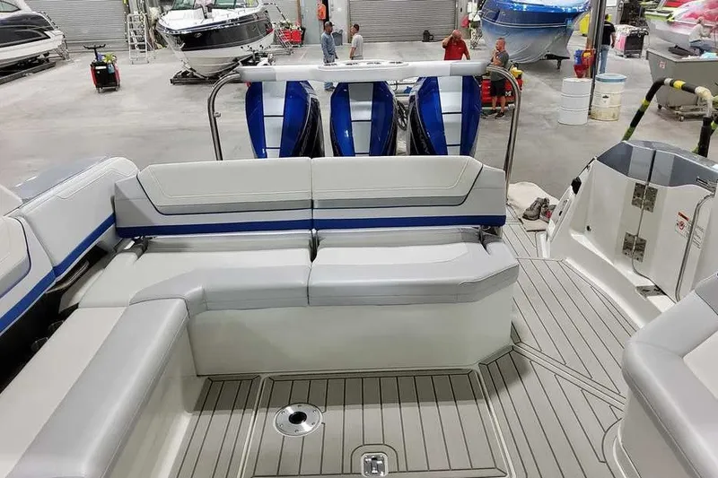 Slide: The Image of 2027 Formula 360 Super Sport Crossover boat interior with sleek seating and modern design. - 14