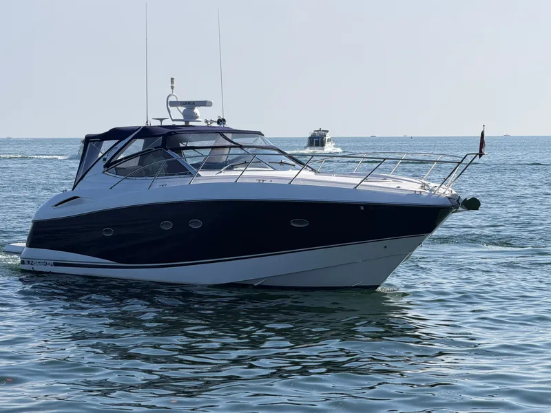 Slide: The Image of A 2006 Sunseeker Portofino 46 on the water. - 4