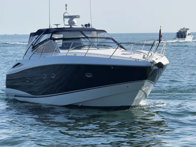 Slide: The Image of 2006 Sunseeker Portofino 46 on calm water. - 3