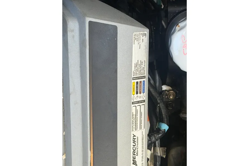 Slide: The Image of Engine compartment of 2010 Sea Ray 390 Sundancer with Mercury MerCruiser label visible. - 5