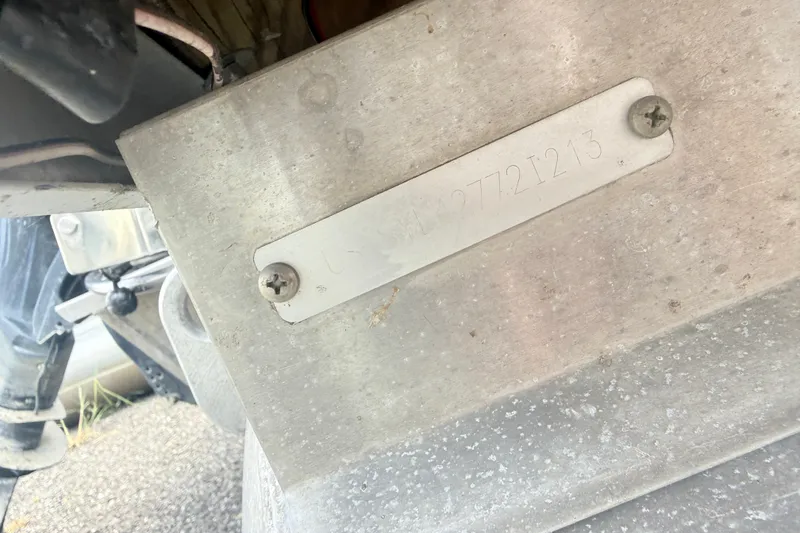 Slide: The Image of Close-up of a 2013 Sylvan Mirage 820 Cruise boat's identification plate. - 10
