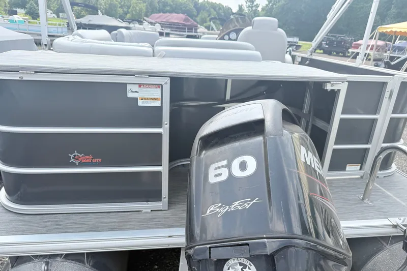 Slide: The Image of 2013 Sylvan Mirage 820 Cruise pontoon boat with a 60 HP Mercury Bigfoot engine. - 1