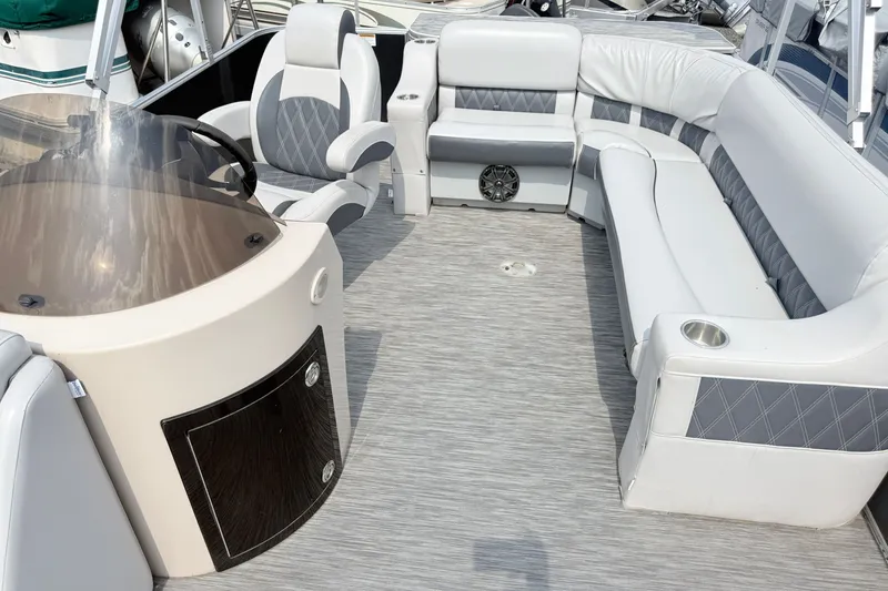Slide: The Image of Luxurious interior of 2013 Sylvan Mirage 820 Cruise pontoon boat with plush seating. - 6