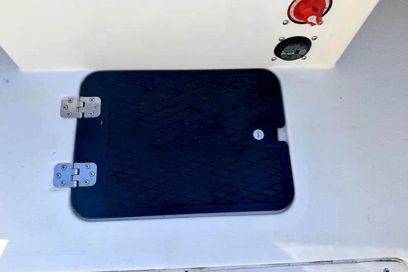 Slide: The Image of Hinged hatch on 2007 Stratos 375 XF boat deck with control panel. - 54