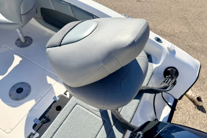 Slide: The Image of Gray seating area of a 2007 Stratos 375 XF boat, showcasing upholstery details. - 24