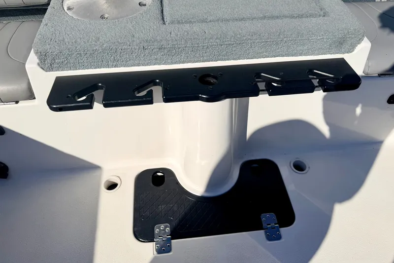 Slide: The Image of 2007 Stratos 375 XF boat interior with rod holder and cushioned seating. - 32