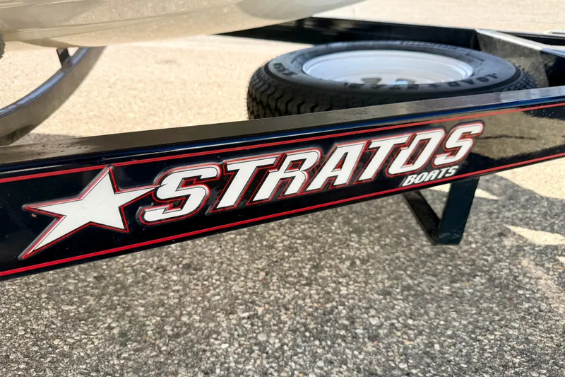 Slide: The Image of Stratos 375 XF 2007 boat trailer with logo on pavement background. - 87