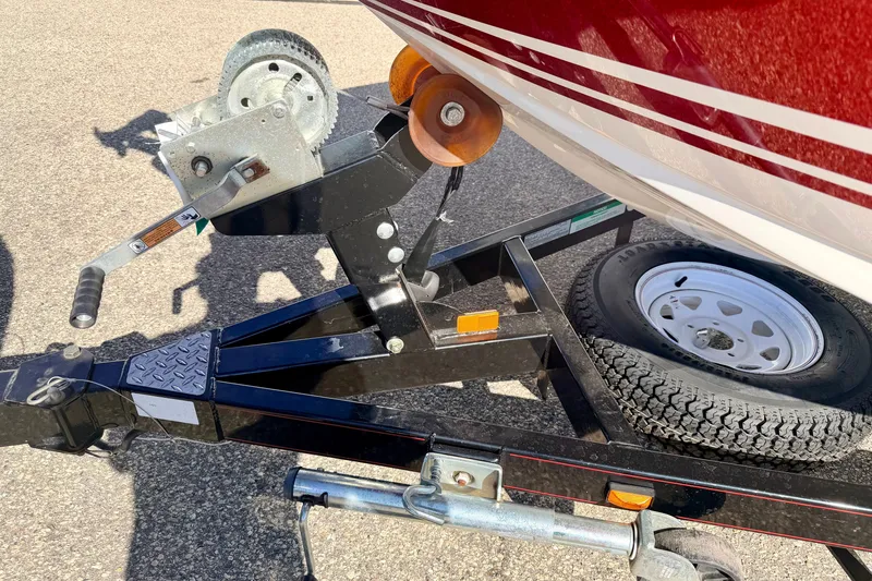 Slide: The Image of Trailer hitch and wheel assembly for 2007 Stratos 375 XF boat. - 81