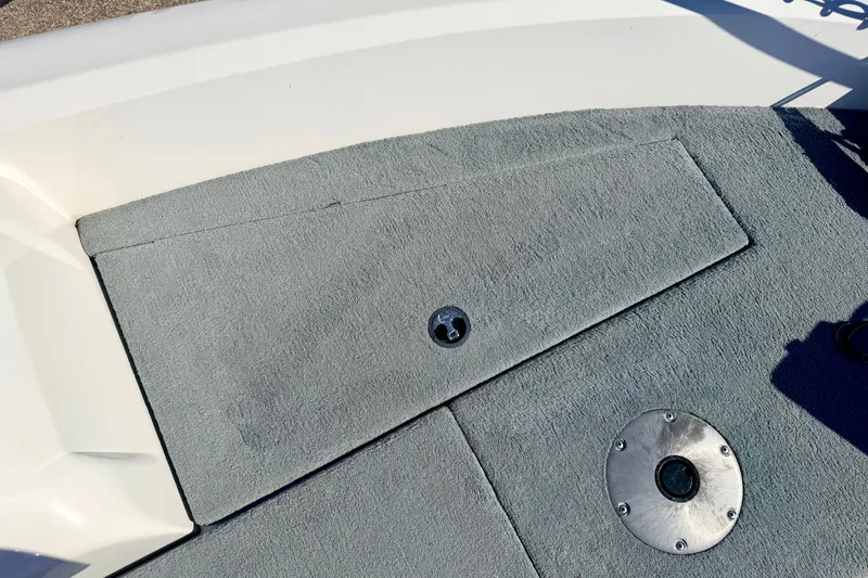 Slide: The Image of Deck of 2007 Stratos 375 XF boat with carpet and metal fixtures. - 60