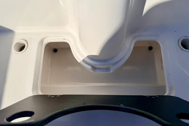 Slide: The Image of Close-up of a 2007 Stratos 375 XF boat compartment with mounting bracket. - 33