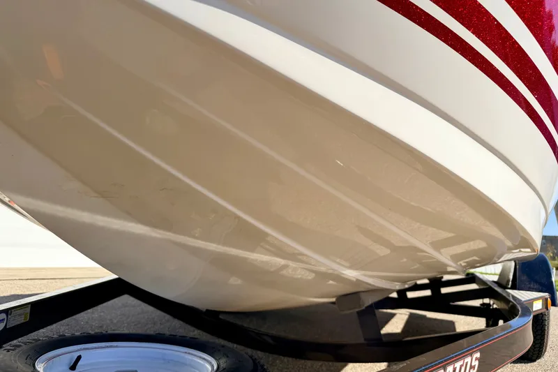 Slide: The Image of Close-up of a 2007 Stratos 375 XF boat hull on a trailer. - 82