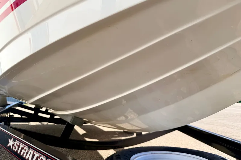 Slide: The Image of Close-up of 2007 Stratos 375 XF boat hull on trailer. - 83