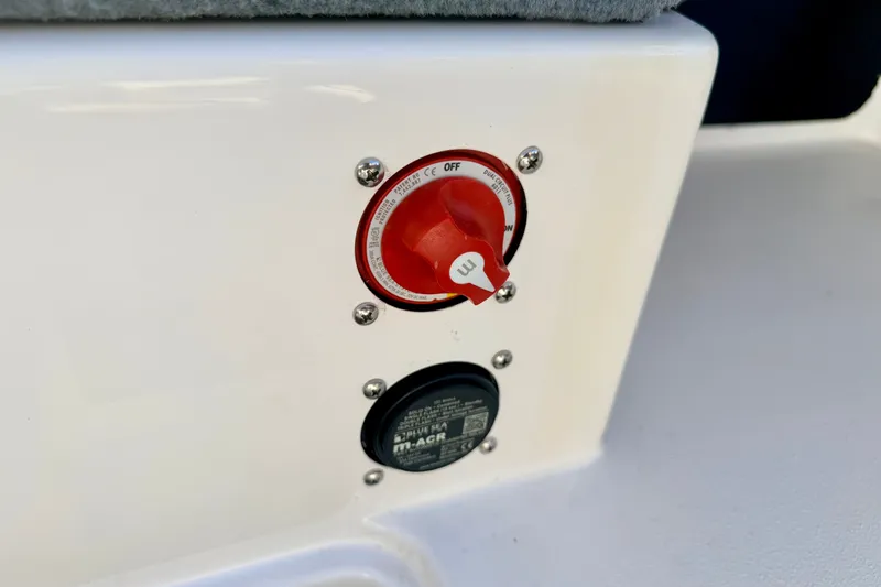 Slide: The Image of Red power switch on 2007 Stratos 375 XF boat panel. - 56
