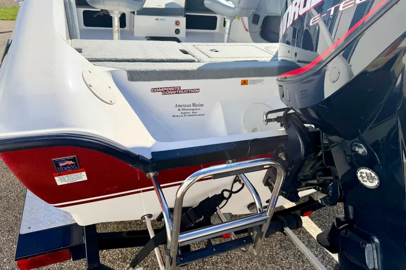 Slide: The Image of Rear view of a 2007 Stratos 375 XF boat with motor and ladder. - 20