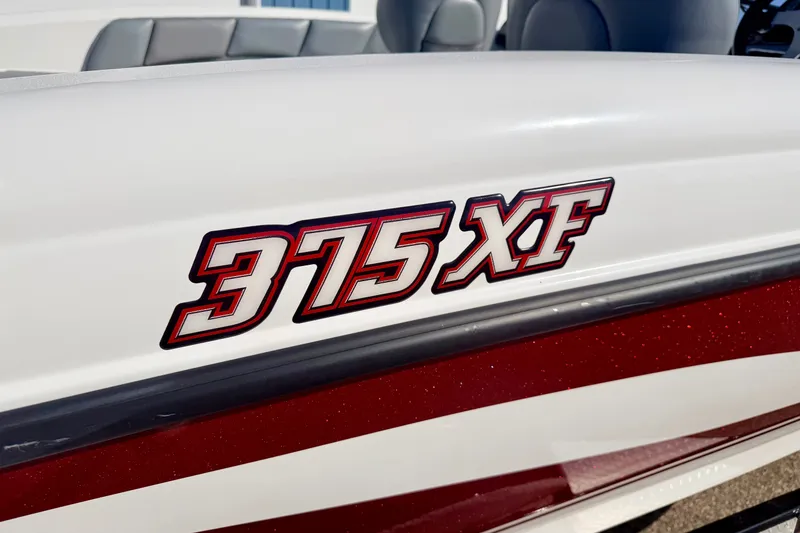 Slide: The Image of Stratos 375 XF 2007 boat model logo on white and red exterior. - 14