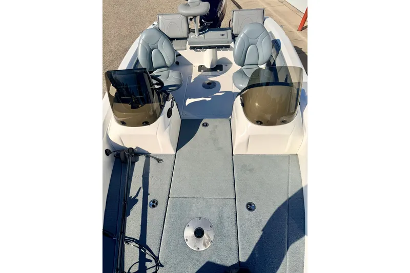 Slide: The Image of 2007 Stratos 375 XF boat interior with dual seats and windshields. - 74