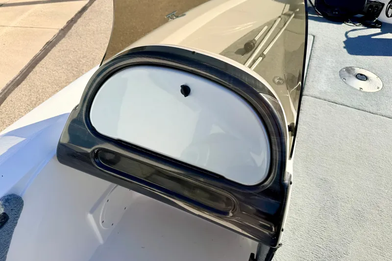 Slide: The Image of 2007 Stratos 375 XF boat dashboard with windshield, close-up view. - 52