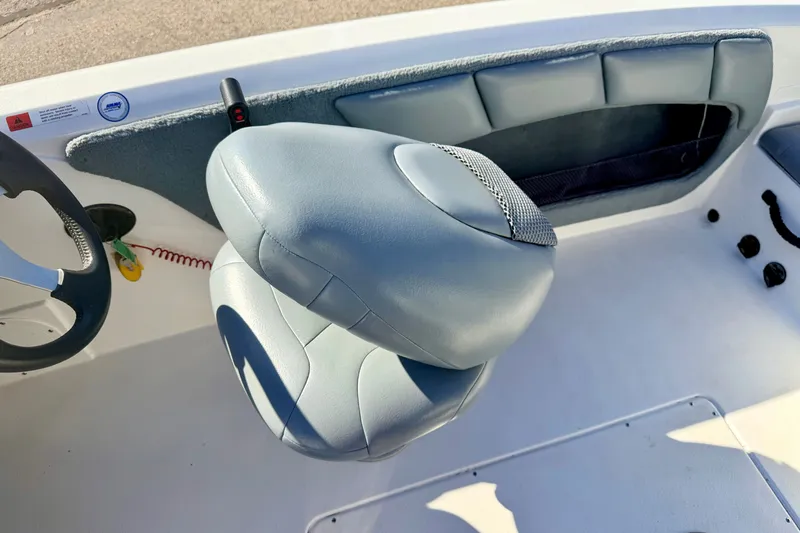 Slide: The Image of Captain's seat and steering wheel of a 2007 Stratos 375 XF boat. - 38