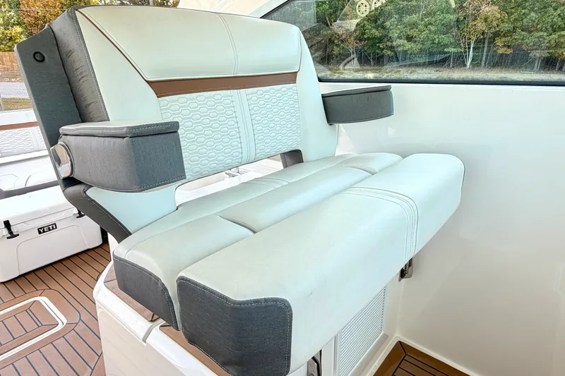 Slide: The Image of Luxury seating on 2020 Tiara Sport 34 LX boat, featuring premium upholstery and design. - 25
