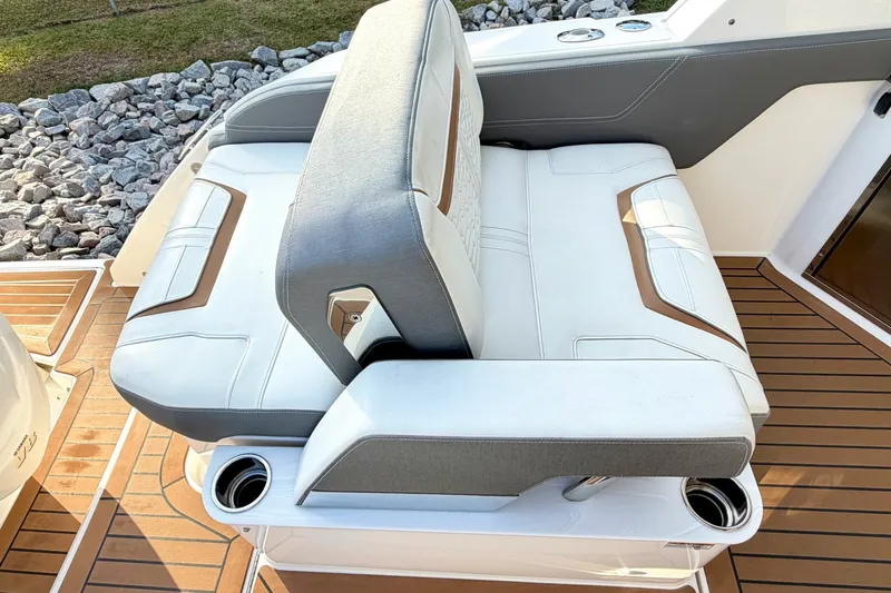 Slide: The Image of Luxury seating on 2020 Tiara Sport 34 LX boat with cup holders and stylish design. - 14
