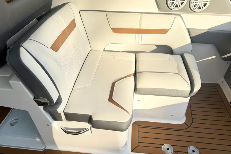 Slide: The Image of Luxurious seating on 2020 Tiara Sport 34 LX boat with elegant upholstery and teak flooring. - 17
