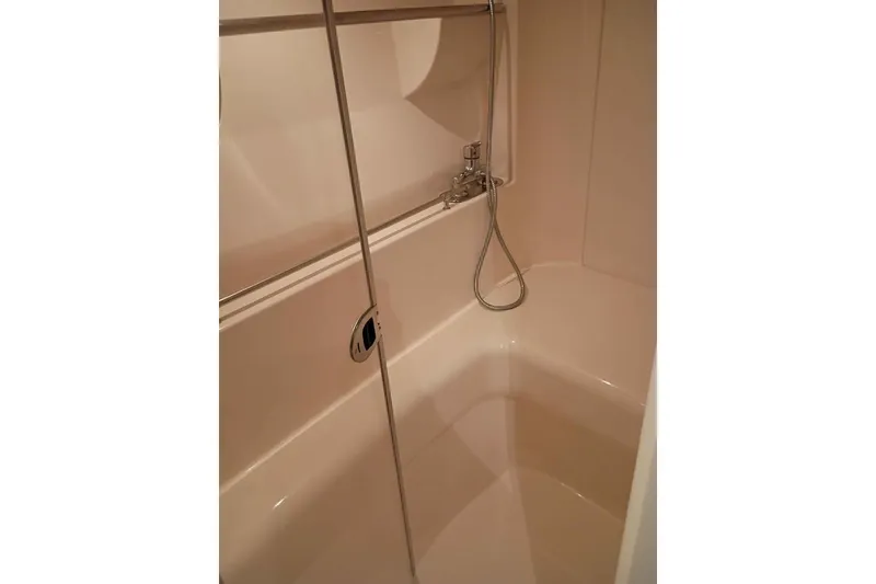 Slide: The Image of 2003 Carver 350 Mariner bathroom with shower and sliding door. - 10