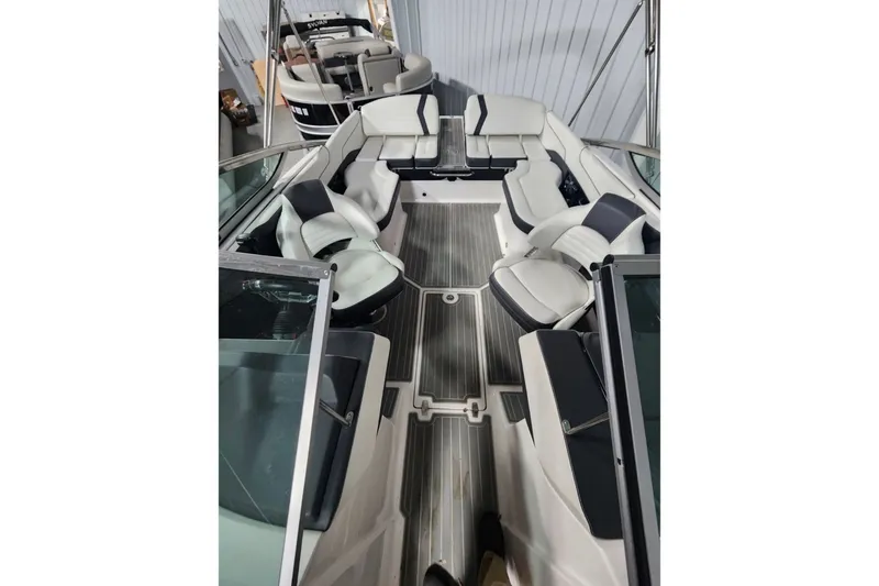 Slide: The Image of 2017 Regal 2300 Bowrider interior with sleek seating and modern design. - 4