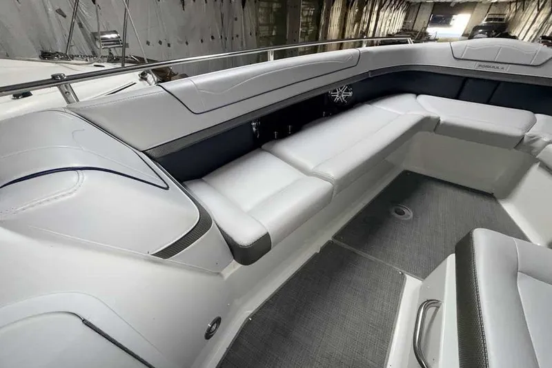 Slide: The Image of 2019 Formula 350 Crossover Bowrider I/O interior with sleek white seating and modern design. - 27
